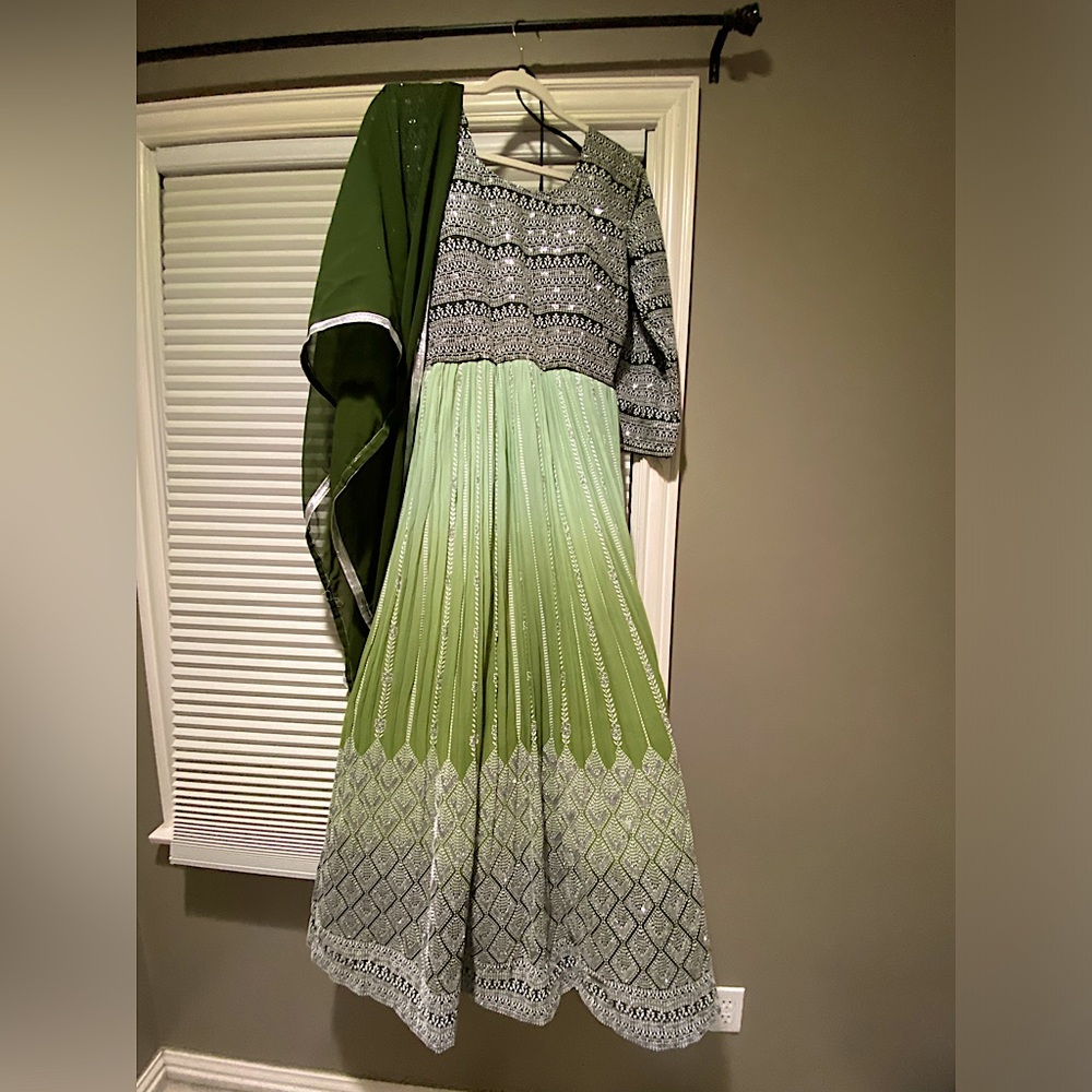 Designer boutique piece ethnic dress .
